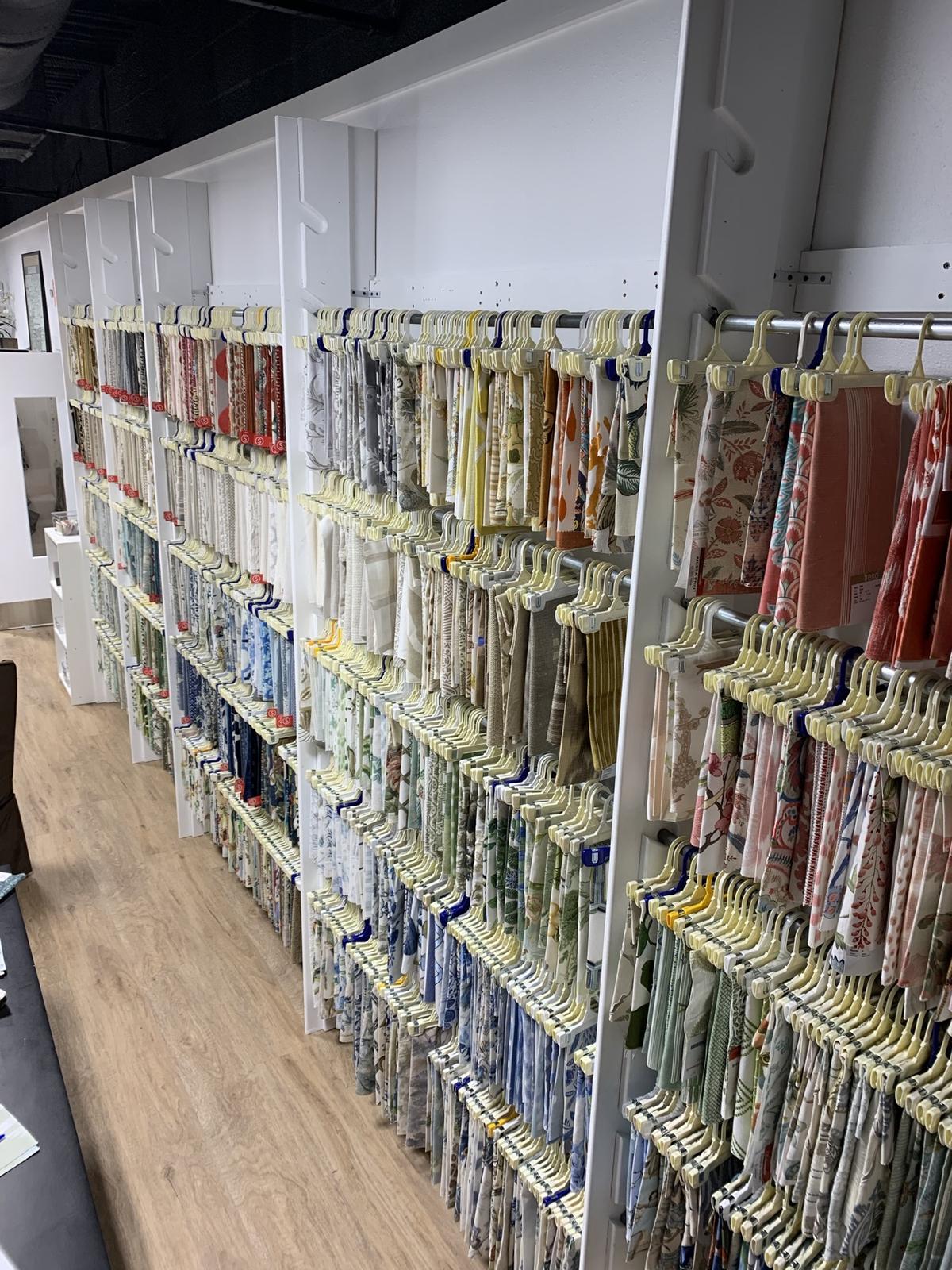 Shelves of fabric sample books