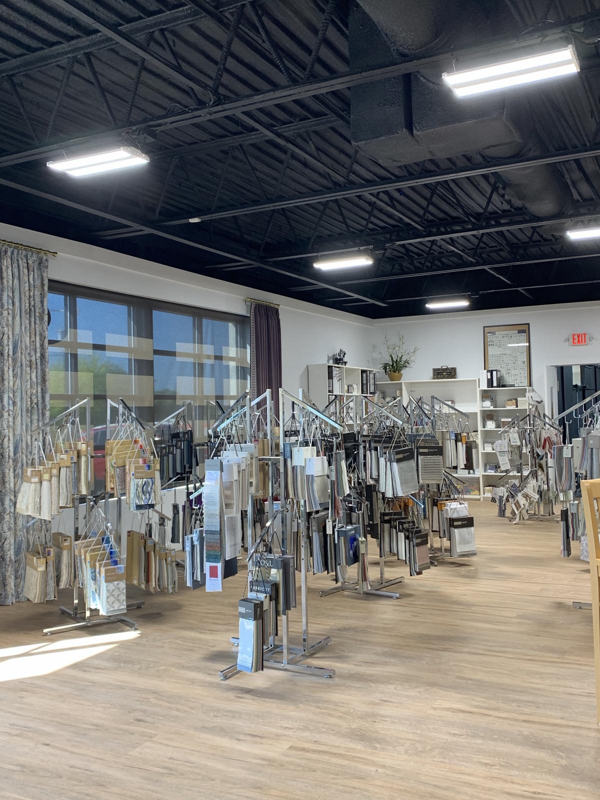 Fabric and trim sample racks in the showroom