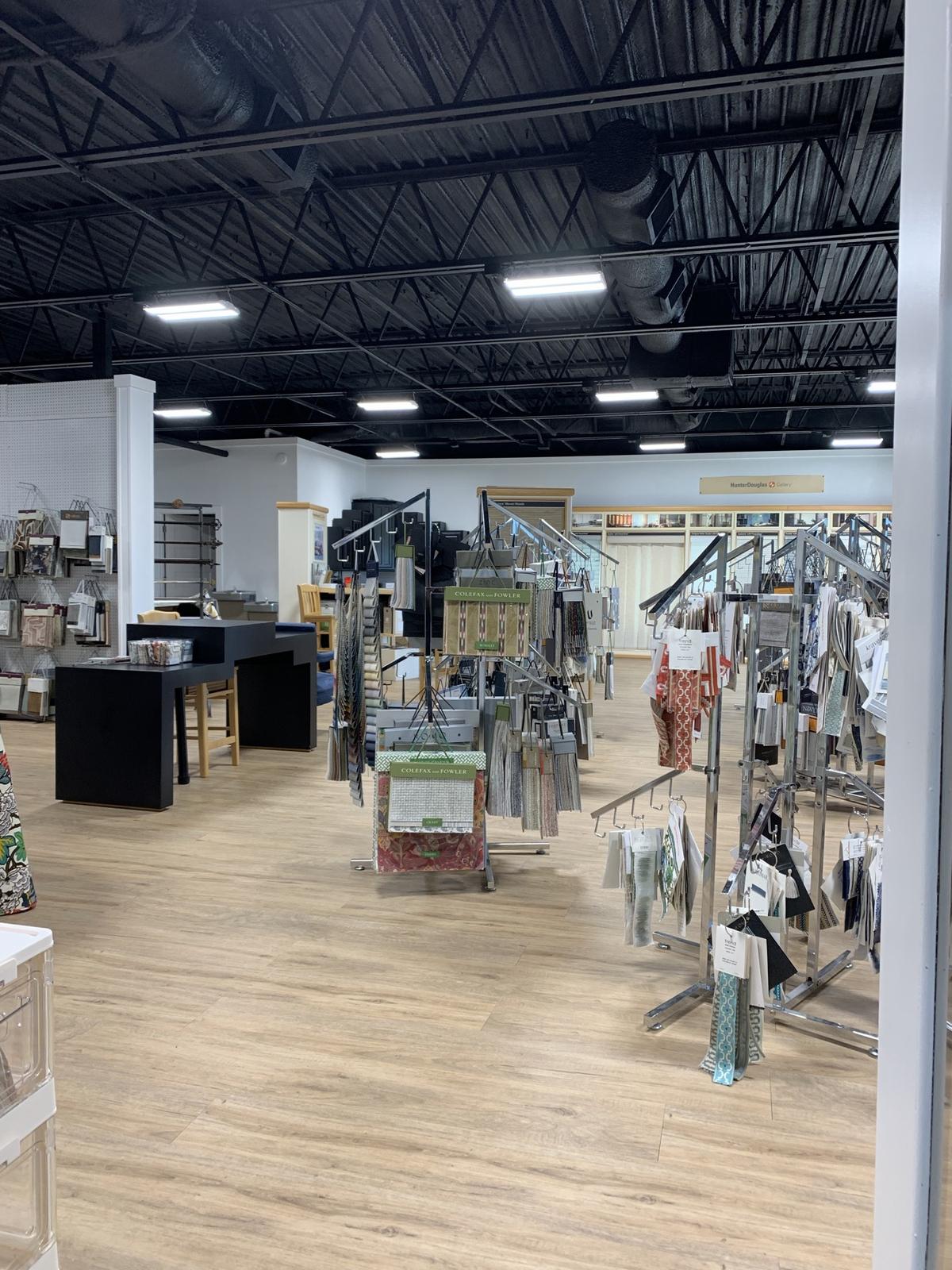 Sample racks and seating in the showroom