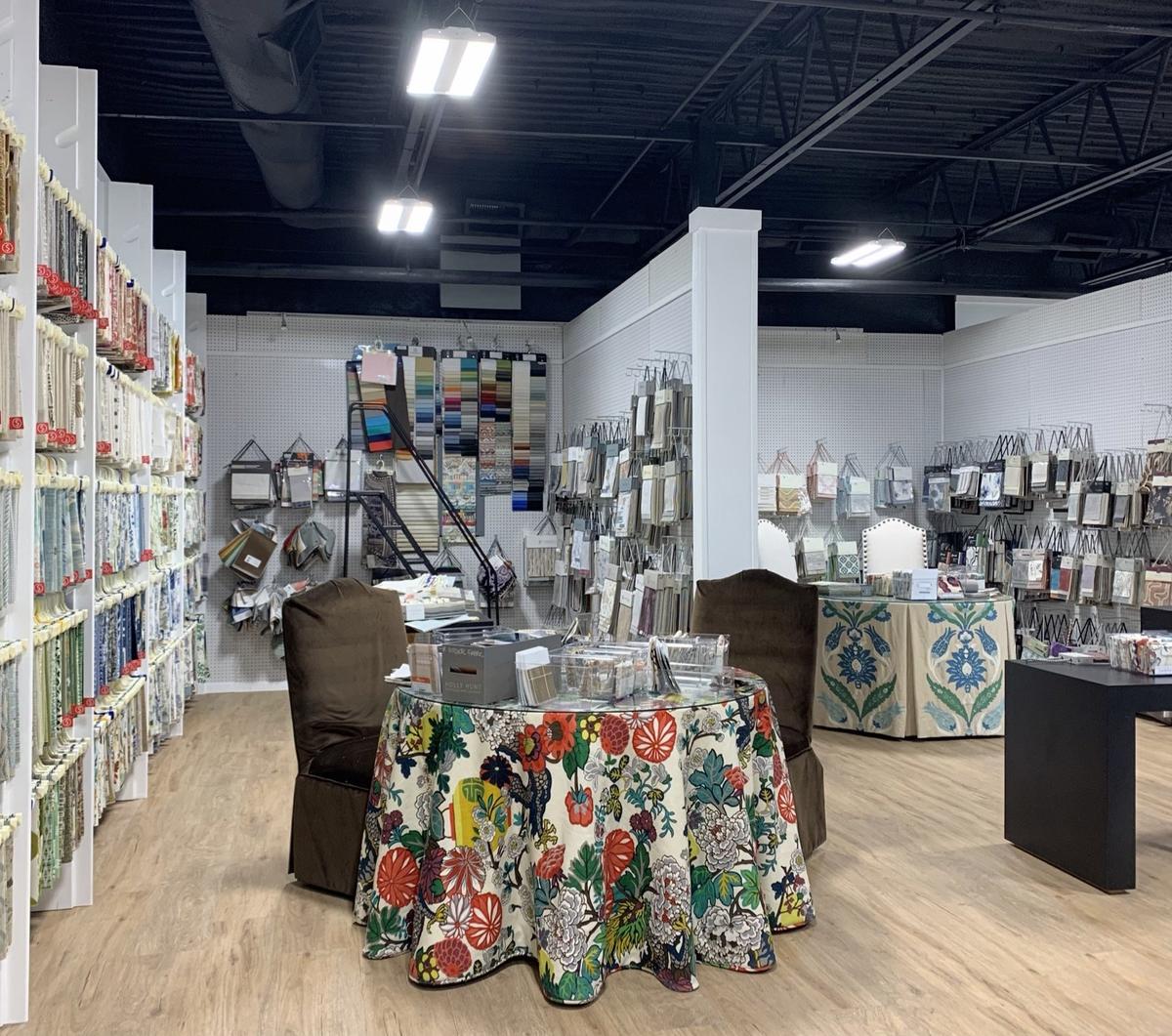 The Interior Fabrics showroom: sample books, display racks, and the work table