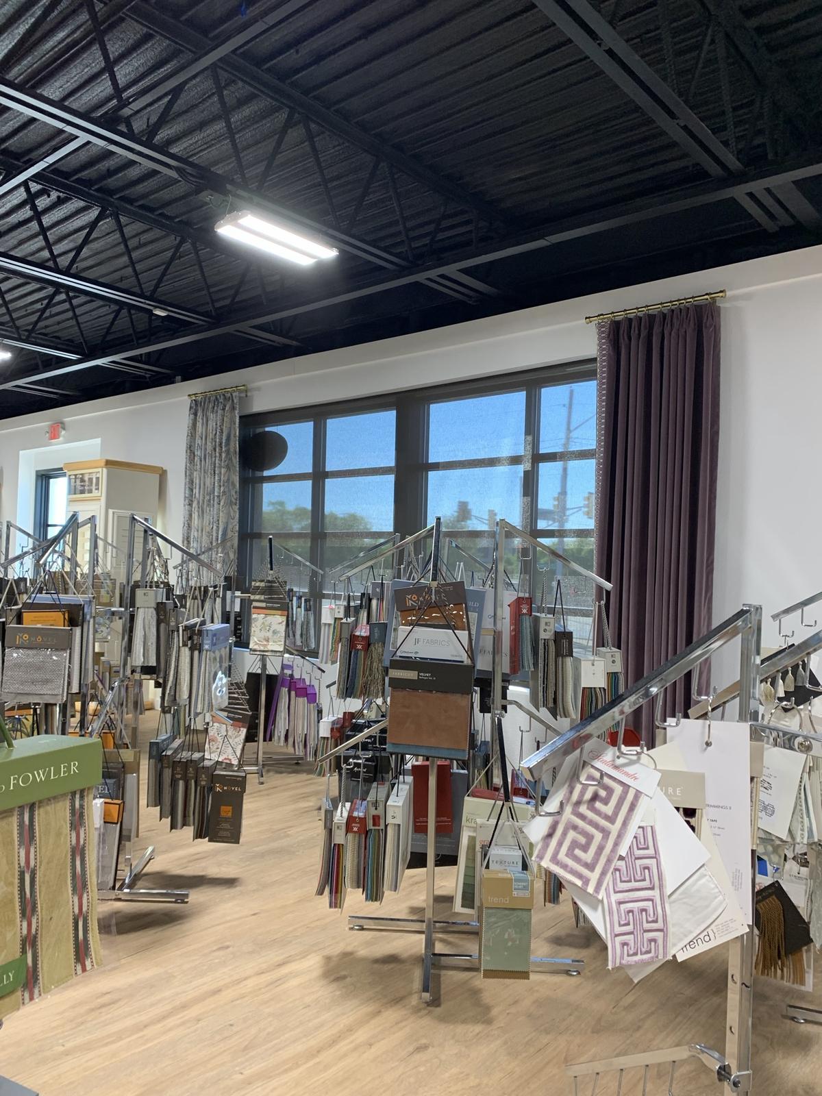 Sample racks by the showroom windows